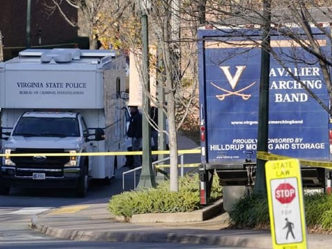 A Virginia State Police crime scene investigation truck is on the scene of an overnight shooting at the University of Virginia, Monday, Nov. 14, 2022, in Charlottesville, Virginia. 