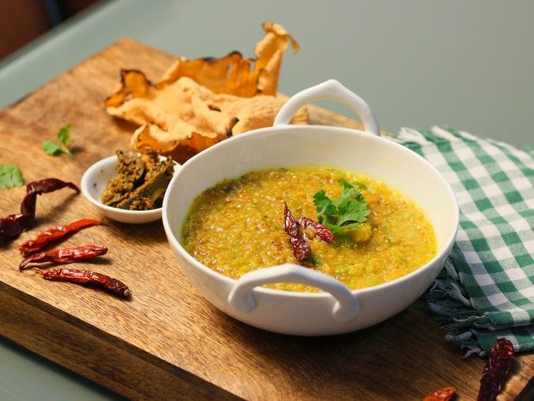 A bowl of yellow mung dal khichdi 