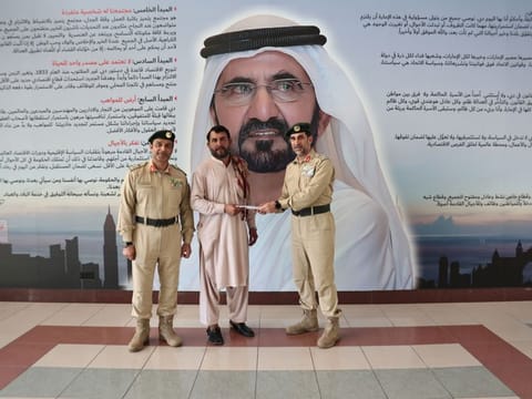 Dubai Police honouring Pakistani expat Abbas Khan. 
