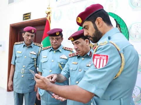 Police officials review the campaign's progress