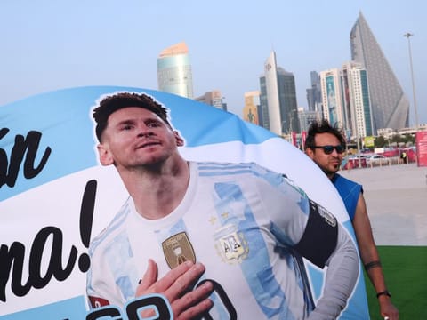 Argentina fans display a banner of Lionel Messi at the opening of the FIFA fan festival at Al Bidda Park, Doha, Qatar.