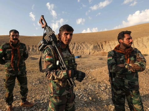 Kurdish Peshmerga fighters affiliated with the Kurdistan Freedom Party (PAK), man a position near town city of Altun Kupri (Perdi), north of Kirkuk, in Iraq's autonomous Kurdistan region, on November 23, 2022. 