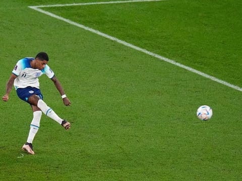 England's Marcus Rashford scores his side's first goal during the World Cup group B soccer match between England and Wales, at the Ahmad Bin Ali Stadium in Al Rayyan , Qatar, Tuesday, Nov. 29, 2022. 