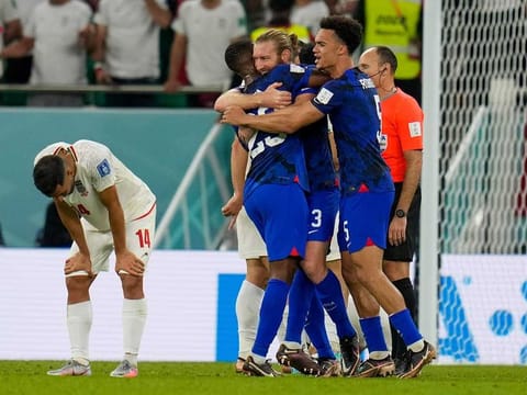 US players celebrate after the World Cup group B soccer match between Iran and the United States at the Al Thumama Stadium in Doha, Qatar, Wednesday, Nov. 30, 2022. 