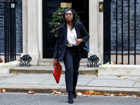 British Secretary of State for International Trade Kemi Badenoch walks outside Downing Street in London, Britain December 6, 2022.