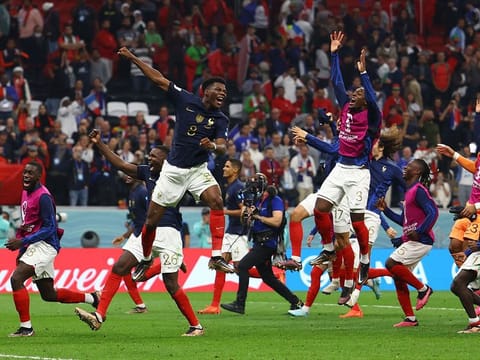 France's Aurelien Tchouameni, Axel Disasi and teammates celebrate after the match as France reach the final 