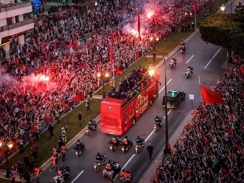 Supporters cheer as Morocco's national football team arrives to the center of the capital Rabat.