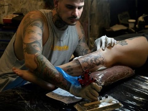  Messi sparks tattoo madness among Argentina fans