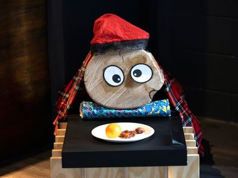In photos: Clothe and feed a 'Christmas log' to receive gifts at Andorra Pavilion
