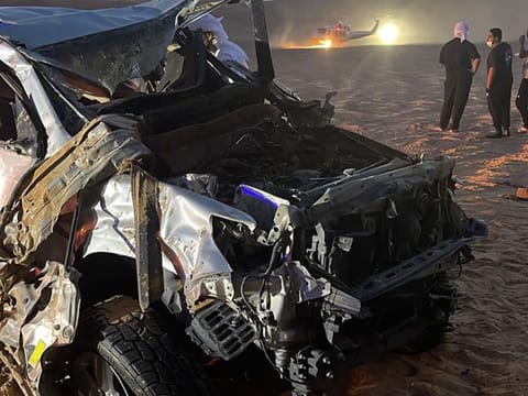 A damaged vehicle after the collision in the desert. 
