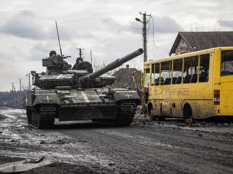 Ukrainian servicemen ride a tank, as Russia's attack on Ukraine continues, in the village of Torske, Donetsk region, Ukraine December 30, 2022.  