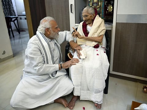 File picture of Prime Minister Narendra Modi meeting his mother Heeraben Modi,