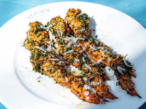 Grilled Peri-peri chicken wings with crispy Gremolata