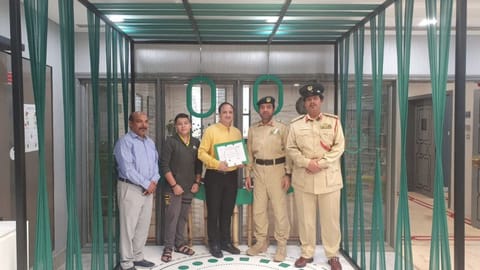 Indian expat Upendra Nath Chaturvedi being honoured by Dubai Police officials for handing over Dh134,930 in cash.