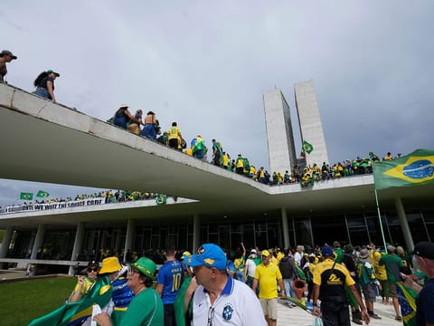 Protesters, supporters of Brazil's former President Jair Bolsonaro, storm the National Congress building in Brasilia, Brazil, Sunday, Jan. 8, 2023. 