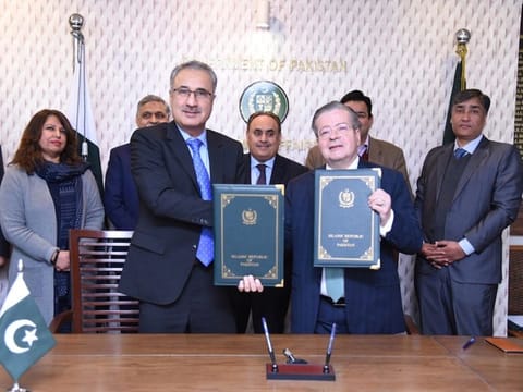 Secretary of Economic Affairs Division Dr. Kazim Naiz and French Ambassador Nicolas Galey at the hydropower project funding signing ceremony in Islamabad on January 16, 2023. 