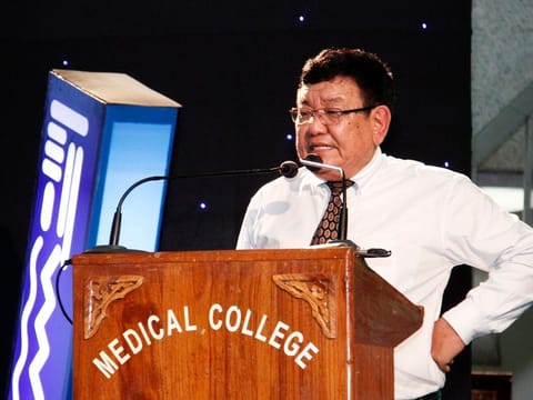 Dr Sanduk Ruit speaking at a medical conclave. The cataract surgery lenses manufactured by his centres are provided  to over thirty countries at very low cost.