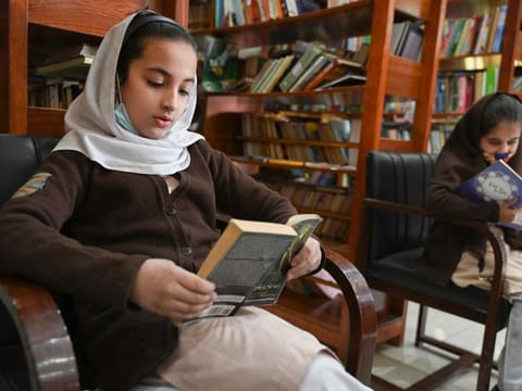 Students inside the Darra Adam Khel Library in Darra Adamkhel town, some 35km south of Peshawar. Darra Adamkhel has long been known for its black market bazaars stocked with forged American rifles, replica revolvers and rip-off AK-47s. 