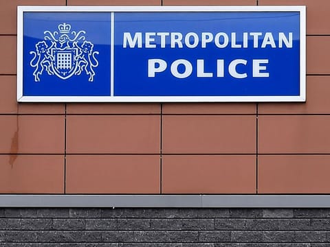 The Met Police sign is seen outside the Croydon Custody Centre in south London. 
