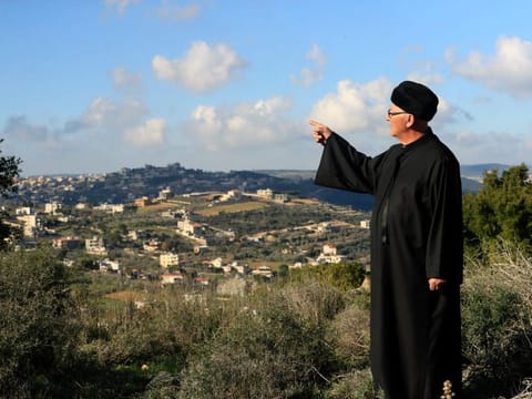 Najib Al Ameel stands on a hill overlooking his hometown Rmaych along the Lebanese-Israeli border. Green Without Borders that is active in southern Lebanon, including areas along the border with Israel, is being blamed by Israel, the US and some in Lebanon for being an arm for Hezbollah to cover some of the group's military activities.  