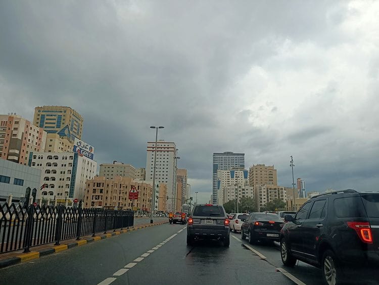 Rain clouds, rain, clouds, rain clouds hover above Emirates road