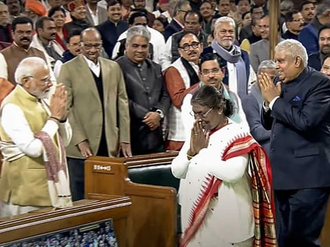 President Droupadi Murmu greets Prime Minister Narendra Modi as she leaves after addressing the joint sitting of Lok Sabha and Rajya Sabha in Parliament on the first day of the Budget Session 2023, in New Delhi on Tuesday, January 31, 2023. Also seen is Vice-President Jagdeep Dhankhar. 