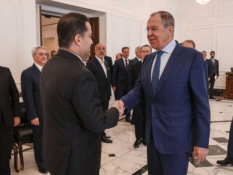 Russian Foreign Minister Sergei Lavrov (R) meets with Iraq's Prime Minister Mohammed Shia' Al Sudani in Baghdad on February 6, 2023. 