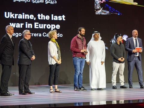 (Fourth from left) Spanish photojournalist and videographer Diego Herrera Carcedo receiving the top award at the Independent Freelance Photojournalist Awards (IFPA) ceremony held at the Xposure International Photography Festival on Friday.