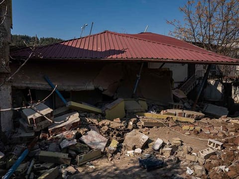 Remains of the house in which Hassan Mounir Khateb died shielding his family from their collapsing roof after a 7.8-magnitude earthquake. 