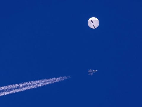 A missile fired by a U.S. F-22 off the Carolina coast ended the days-long flight of what the Biden administration says was a surveillance operation that took the Chinese balloon near U.S. military sites.