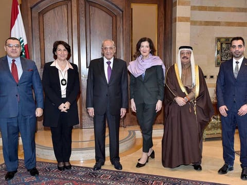 A handout picture provided by the Lebanese Parliament website shows Lebanese Parliament Speaker Nabih Berri (3rd-L) posing for a group photo with ambassadors and representatives of Egypt (L), France (2nd-L), the United States (3rd-R), Saudi Arabia, and Qatar at the parliament headquarters in the capital Beirut on February 13, 2023. 