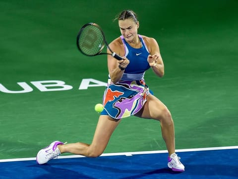 World No. 2 Aryna Sabalenka of Belarus powers a forehand against Jelena Ostapenko of Latvia in the third round of the Dubai Duty Free Tennis Championships on February 22, 2023. Forehand winners were a feature of Sabalenka’s win against the defending champion. 