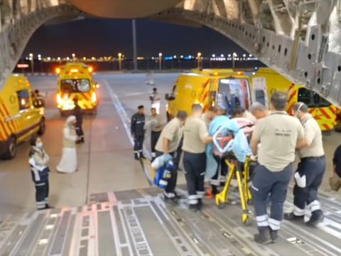 Still from video showing the injured being cared for in the UAE upon their arrival from Syria