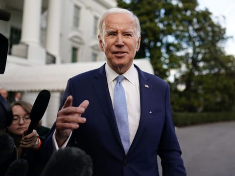 US President Joe Biden speaks to members of the media before boarding Marine One on the South Lawn of the White House in Washington, DC, US, on Friday, Feb. 24, 2023.  
