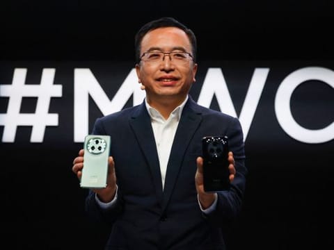 George Zhao, CEO of Honor Device, presents a new product, Honor Magic5 Pro, at the 2023 Mobile World Congress.