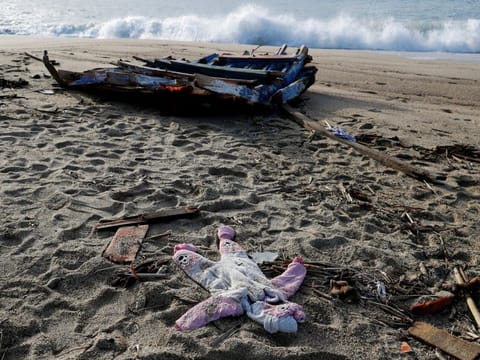 A piece of the boat and a piece of clothing from the deadly migrant shipwreck are seen in Steccato di Cutro near Crotone, Italy, February 28, 2023.  