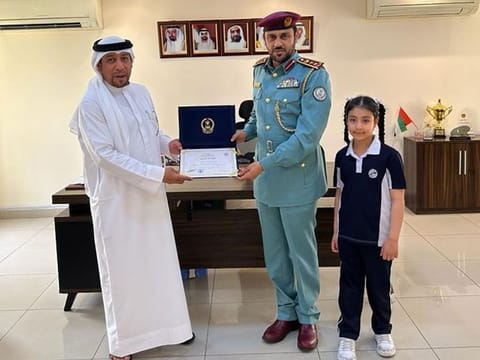 Ali Mohammed Al Suwaidi, left, was honoured by Sharjah Police, after he informed authorities about men sleeping in a public area.