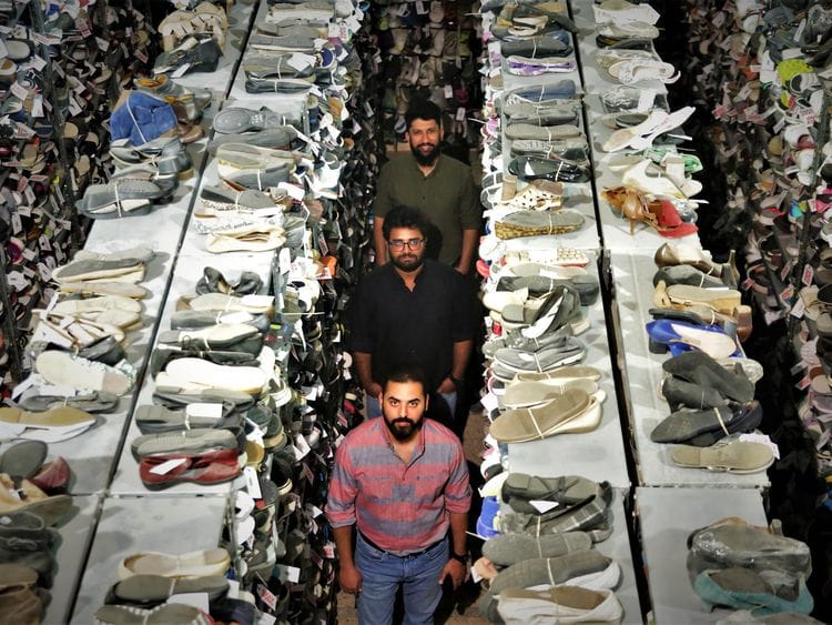 Cofounders in Swag Kicks warehouse-1677744600196