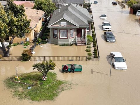 Photos: Flood problems grow as new storm moves into California