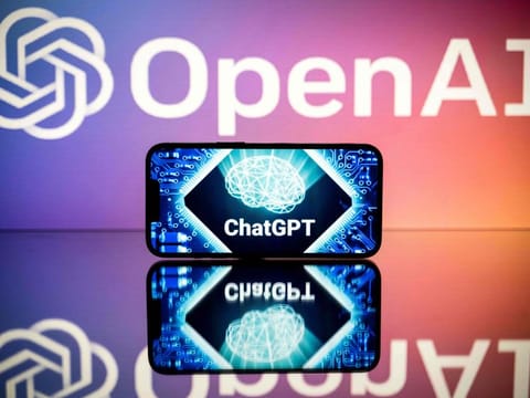 Screens displaying the logos of OpenAI 