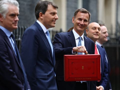 Britain's Chancellor of the Exchequer Jeremy Hunt has ruled out a major spending spree or big tax cuts in his budget plan.