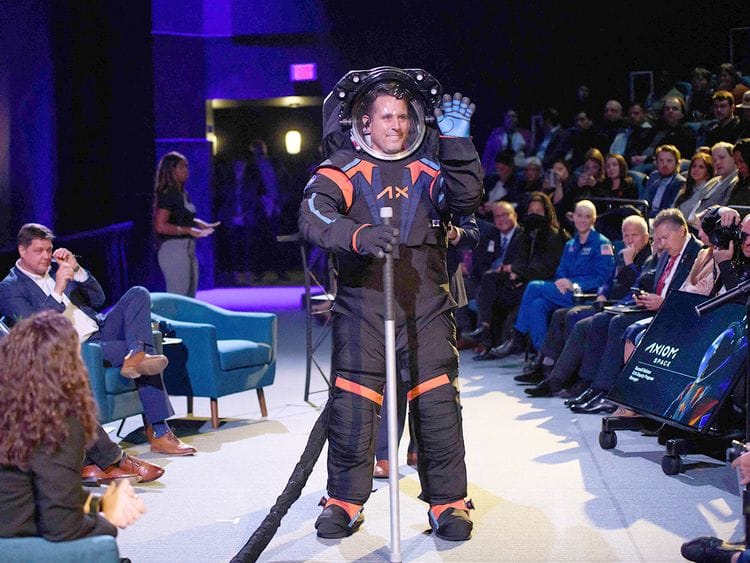 Chief Engineer Jim Stein wears the new spacesuit during