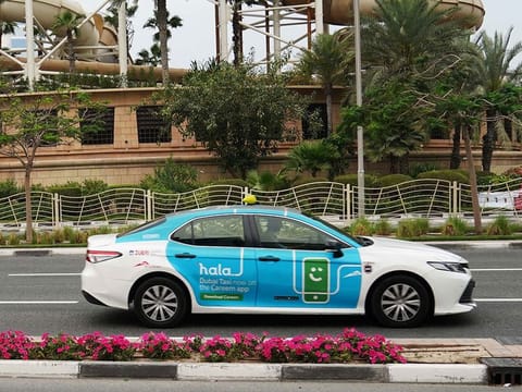 Archive image of an e-hail Hala taxi in Dubai 