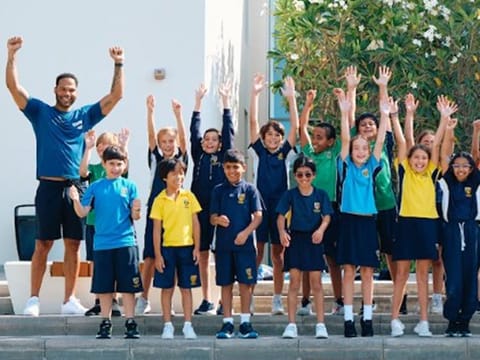 Man City legend Joleon Lescott (left) took part in the Healthy Lifestyle programme at Cranleigh Abu Dhabi to help educate kids on health and fitness. 
