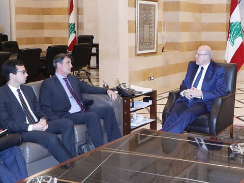 Lebanese caretaker prime minister Najib Mikati (right) meeting with a delegation from the Ineternational Monetary Fund (IMF) at the governmental palace in Beirut on March 23, 2023. 