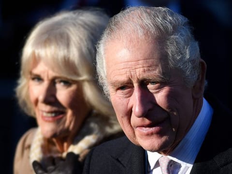Britain's King Charles III and Britain's Camilla in a file photo. Charles was due to visit France on Sunday.
