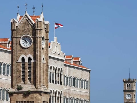 Clock towers are pictured near the government palace in Beirut, Lebanon March 27, 2023. 
