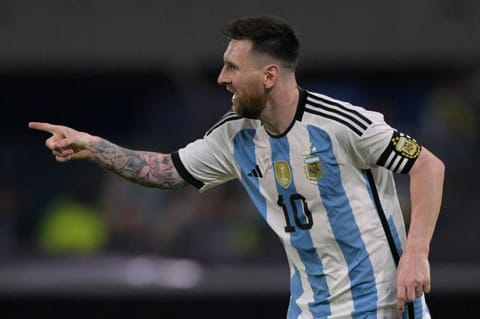 Argentina's forward Lionel Messi celebrates after scoring his 100th goal with the national team during the friendly against Curacao at the Madre de Ciudades stadium in Santiago del Estero, in northern Argentina.