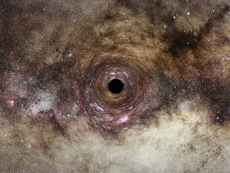 An artist’s impression of a black hole in the Milky Way galaxy