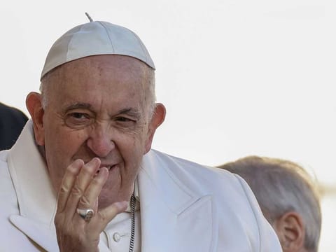 Pope Francis arrives on his popemobile to lead his weekly audience in St. Peter's Square at the Vatican, on Wednesday, March 29, 2023.  